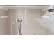 Neutral painted room with utility connections and shelving at 2654 Laurel View Dr, Snellville, GA 30039
