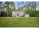Charming two-story home with a well-manicured lawn and attached two-car garage at 2799 Lake Jodeco Rd, Jonesboro, GA 30236