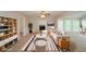 Staged living room with fireplace, neutral walls, and a bright seating area at 2799 Lake Jodeco Rd, Jonesboro, GA 30236