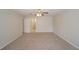 Large main bedroom with neutral walls, carpet flooring, and an ensuite bathroom at 2799 Lake Jodeco Rd, Jonesboro, GA 30236