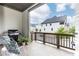 Outdoor balcony features seating, barbecue grill, and neighborhood views at 3900 Danube Ln, Atlanta, GA 30339