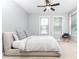 Light-filled bedroom featuring neutral colors, carpet flooring, and natural light at 3900 Danube Ln, Atlanta, GA 30339