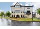 Well-maintained exterior with a brick facade, manicured lawn, and elegant architectural details at 3900 Danube Ln, Atlanta, GA 30339