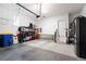 Well-organized garage featuring storage shelves, work area, and ample space for vehicles at 3900 Danube Ln, Atlanta, GA 30339