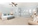 Spacious main bedroom featuring large windows for natural light and comfortable seating area at 3900 Danube Ln, Atlanta, GA 30339