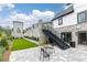 Stone patio with outdoor seating and landscaped area, perfect for relaxing and entertaining at 3900 Danube Ln, Atlanta, GA 30339