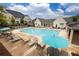 Stunning community pool surrounded by lounge chairs, umbrellas, and beautifully landscaped areas at 3900 Danube Ln, Atlanta, GA 30339