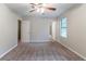 This bedroom features neutral walls, plush carpeting, and natural light, creating a peaceful atmosphere at 4766 White Oak Path, Stone Mountain, GA 30088