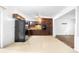 Cozy kitchen with wooden cabinets, tile backsplash, and modern appliances at 6535 Buckhurst Trl, Atlanta, GA 30349