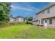 Expansive backyard featuring a well-maintained lawn, perfect for outdoor activities and relaxation at 6683 Princeton Park Ct, Lithonia, GA 30058