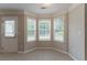 Bright breakfast nook featuring a large window, neutral paint, and tile flooring at 6683 Princeton Park Ct, Lithonia, GA 30058