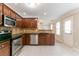 Updated kitchen featuring stainless steel appliances and granite countertops at 6683 Princeton Park Ct, Lithonia, GA 30058