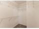 Walk-in closet with ample white wire shelving and carpet at 6683 Princeton Park Ct, Lithonia, GA 30058