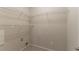 Walk-in closet with wire shelving and tile flooring at 6683 Princeton Park Ct, Lithonia, GA 30058