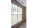 Large window provides ample natural light, enhancing the living space at 6683 Princeton Park Ct, Lithonia, GA 30058