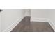Bright hallway features hardwood floors, white walls, and modern trim work at 115 Thome Dr, Alpharetta, GA 30022