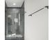 Modern shower with gray tile, glass door, and sleek fixtures at 115 Thome Dr, Alpharetta, GA 30022