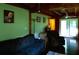 Inviting living room with hardwood floors, a comfortable couch, and access to the outdoors at 3096 Campground Rd, Winston, GA 30187