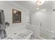 Bathroom showcasing a soaking tub, a standup shower with white tile, and upscale fixtures at 4161 Thunderbird Se Dr, Marietta, GA 30067