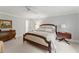 Bedroom featuring a queen bed, soft carpet, and classic furnishings at 4161 Thunderbird Se Dr, Marietta, GA 30067