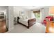 Comfortable bedroom with neutral decor, ample natural light, and cozy furnishings at 4161 Thunderbird Se Dr, Marietta, GA 30067