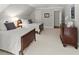 Bedroom with two beds, neutral tones, and a beautiful chest of drawers at 4161 Thunderbird Se Dr, Marietta, GA 30067