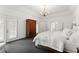 Primary bedroom with a bed, wardrobe, and an ensuite bathroom at 4161 Thunderbird Se Dr, Marietta, GA 30067