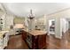 Gourmet kitchen with custom cabinets, large island, and high-end appliances at 4161 Thunderbird Se Dr, Marietta, GA 30067