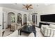 Comfortable living room with arched doorways, a neutral color palette, and a relaxed atmosphere at 4161 Thunderbird Se Dr, Marietta, GA 30067