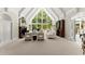 Bright living room with vaulted ceilings, large windows, and elegant decor at 4161 Thunderbird Se Dr, Marietta, GA 30067