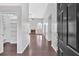 Inviting entryway showcasing wood floors, a brick fireplace and lots of natural light at 46 Centerport Dr, White, GA 30184