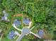 Expansive lot with mature trees outlined in yellow, showcasing a desirable neighborhood setting at 6625 Baywood Run, Cumming, GA 30041