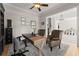 Cozy home office with neutral walls, stylish decor, comfortable seating, and built-in storage at 6625 Baywood Run, Cumming, GA 30041