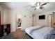 Spacious bedroom with ceiling fan, closet, television, and neutral walls at 780 Nehemiah Sw Ln, Atlanta, GA 30331