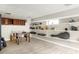 Finished basement space with tile flooring, built-in shelves, and storage at 1195 Russell Dr, Decatur, GA 30030