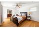Spacious main bedroom with ensuite bathroom access and ample natural light from bright windows at 1195 Russell Dr, Decatur, GA 30030