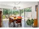 Sunlit dining area featuring a patio view through large glass sliding doors at 1195 Russell Dr, Decatur, GA 30030