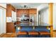 Kitchen island featuring barstool seating and stainless steel appliances at 1195 Russell Dr, Decatur, GA 30030