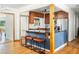 Modern kitchen featuring a breakfast bar with seating, stainless steel appliances, and ample cabinetry at 1195 Russell Dr, Decatur, GA 30030