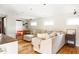 Spacious living room with hardwood floors and a comfortable sectional sofa at 1195 Russell Dr, Decatur, GA 30030
