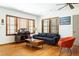 Open living area with hardwood floors, stylish furniture, and vintage accents at 1195 Russell Dr, Decatur, GA 30030