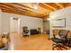 This basement features open ceilings and laminate flooring, offering a blank canvas for customization and flexible usage at 160 Vinnys Way, Covington, GA 30014