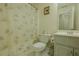 Bathroom with a patterned shower curtain, tile floors, and a single vanity at 160 Vinnys Way, Covington, GA 30014