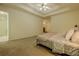 Expansive main bedroom with a tray ceiling and connecting bathroom at 160 Vinnys Way, Covington, GA 30014