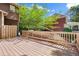 Expansive back deck with wooden railings, beautiful landscaping, and outdoor space for entertaining at 1860 Hill Chase, Alpharetta, GA 30022