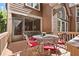 Relaxing back deck featuring a metal dining set with cushioned chairs, and outdoor access at 1860 Hill Chase, Alpharetta, GA 30022