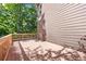 Spacious wooden deck with wooden railing and beautiful landscaping at 1860 Hill Chase, Alpharetta, GA 30022