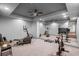 Basement gym featuring mirrored wall, neutral carpet, and fitness equipment at 1860 Hill Chase, Alpharetta, GA 30022
