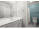 Bathroom with a vanity, mirror, and toilet at 1860 Hill Chase, Alpharetta, GA 30022