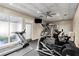 Bright community gym equipped with modern treadmills, elliptical, and weight machines for residents' fitness at 1860 Hill Chase, Alpharetta, GA 30022